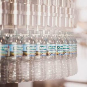 aqua-pura-water-bottles-on-factory-line