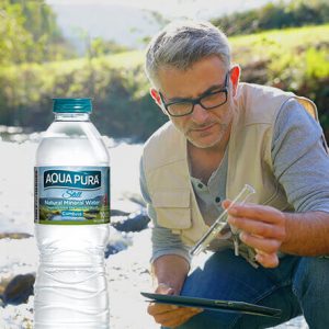 man-testing-water-ph-levels-at-a-stream-in-the-lake-district