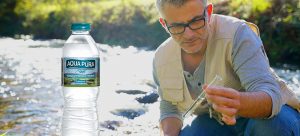 man-testing-water-ph-levels-at-a-stream-in-the-lake-district